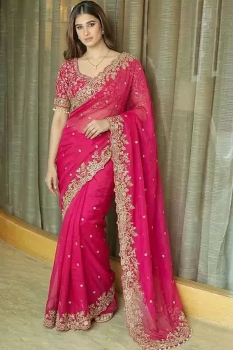 Pink ethnic motifs embroidered satin heavy work saree