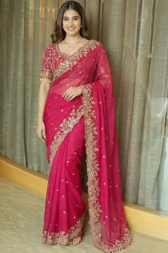 Pink ethnic motifs embroidered satin heavy work saree