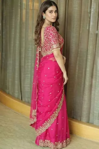 Pink ethnic motifs embroidered satin heavy work saree