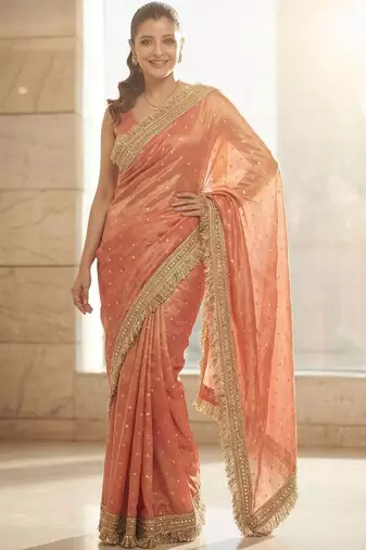 Peach embellished embroidered sequinned sarees with unstitched blouse piece