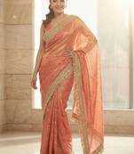 Peach embellished embroidered sequinned sarees with unstitched blouse piece