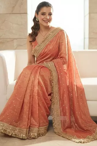 Peach embellished embroidered sequinned sarees with unstitched blouse piece