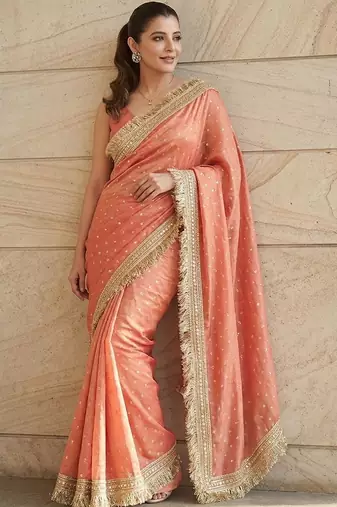 Peach embellished embroidered sequinned sarees with unstitched blouse piece
