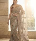 Gold floral embellished embroidered satin sarees with unstitched blouse