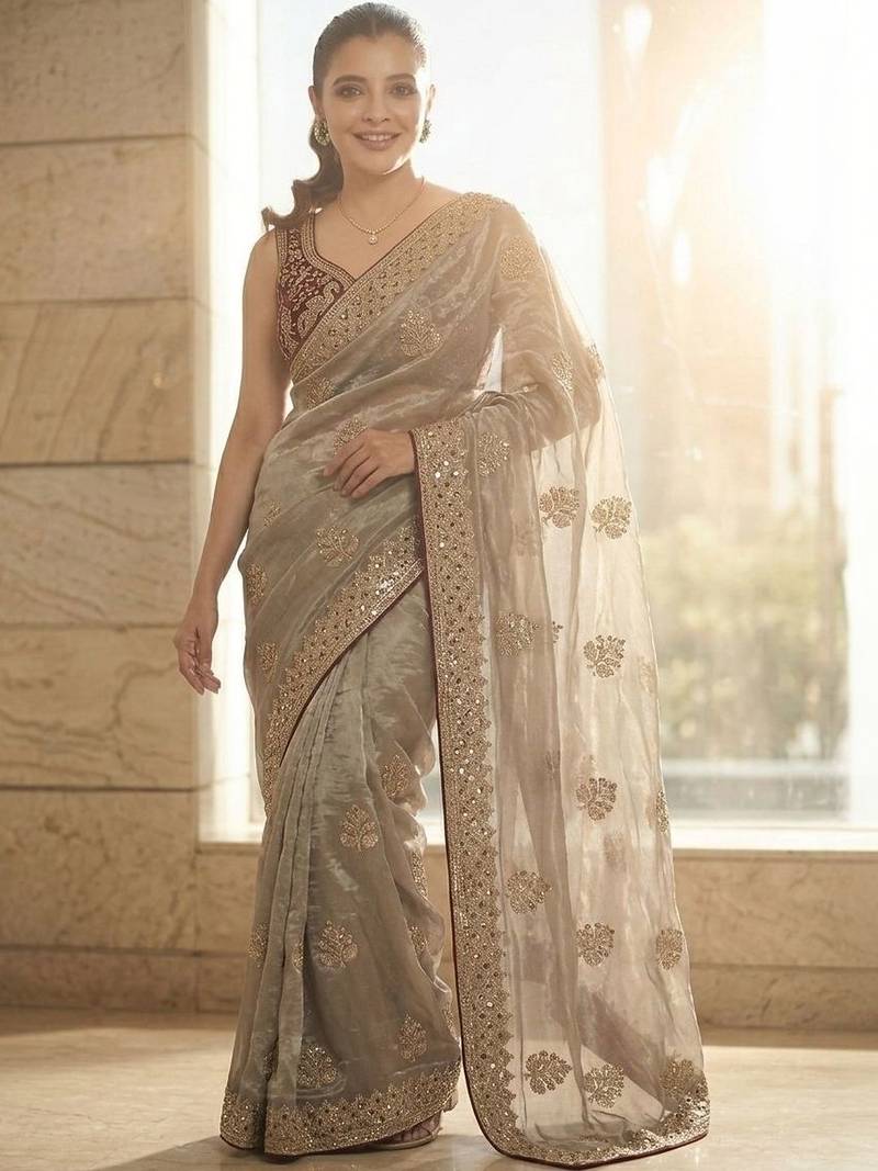Gold floral embellished embroidered satin sarees with unstitched blouse