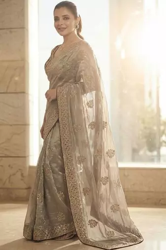 Gold floral embellished embroidered satin sarees with unstitched blouse