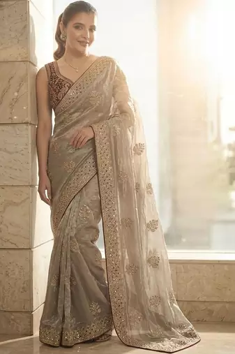 Gold floral embellished embroidered satin sarees with unstitched blouse