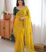 Yellow ethnic motifs sequinned  georgette saree