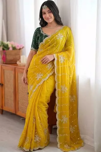 Yellow ethnic motifs sequinned  georgette saree