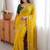 Yellow ethnic motifs sequinned  georgette saree
