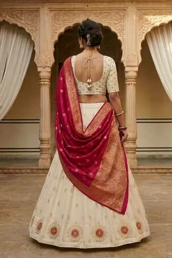 white embroidered party wear lehenga