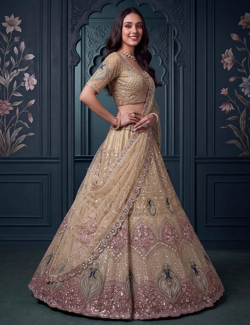 Gorgeous Golden Bead Embroidered Net Sangeet Wear Lehenga Choli