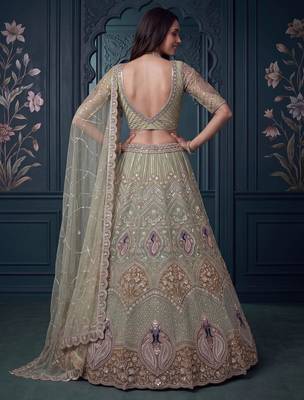 Luxurious Pista Green Hand Work Net Reception Wear Lehenga Choli With Dupatta 4