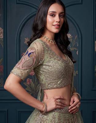 Luxurious Pista Green Hand Work Net Reception Wear Lehenga Choli With Dupatta 5