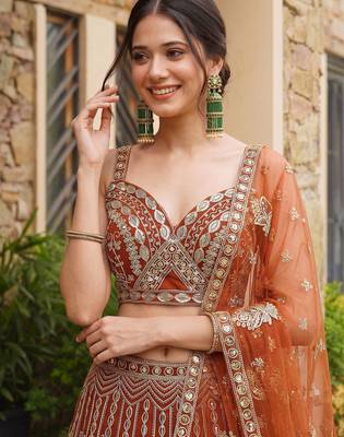 Grand Orange Heavy Embroidered Net Reception Wear Lehenga Choli 5