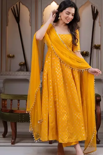 Yellow anarkali kurta set with pant and dupatta for women