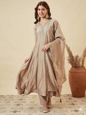 Classy beige heavy embroidered flared kurti with pant & dupatta set 1