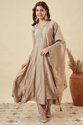Classy beige heavy embroidered flared kurti with pant & dupatta set