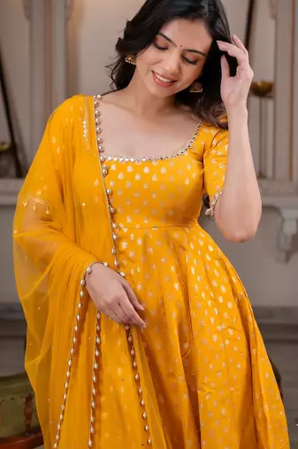 Yellow anarkali kurta set with pant and dupatta for women