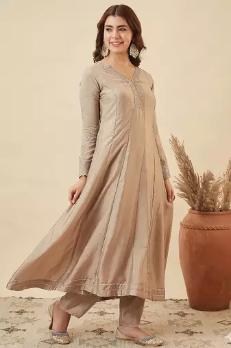 Classy beige heavy embroidered flared kurti with pant & dupatta set