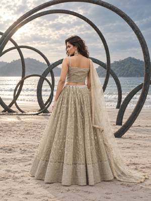 OFF WHITE NET THREAD WITH ZARI AND SEQUINCE WORK FESTIVE LEHENGA CHOLI SET FOR WOMEN'S 2