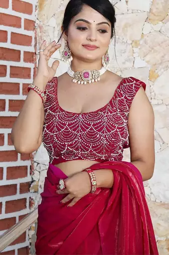 Pink embellished beads and stones studded tissue saree