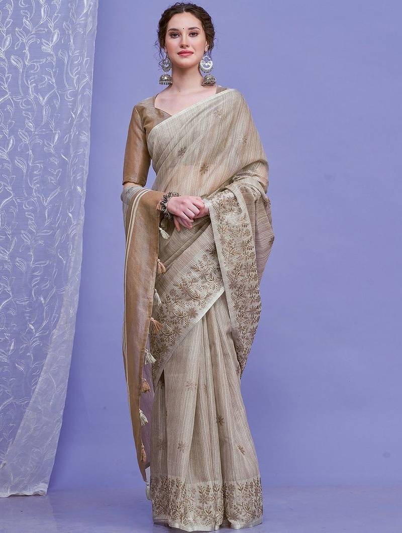 beige floral embroidered sequinned saree with unstitched blouse piece
