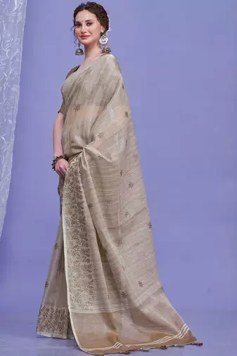 beige floral embroidered sequinned saree with unstitched blouse piece
