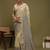 beige ethnic motifs satin block print saree