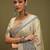 beige ethnic motifs satin block print saree