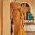 Mustard women  ethnic print ikat saree