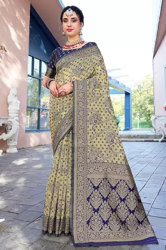cream & blue ethnic motifs woven design zari organza saree