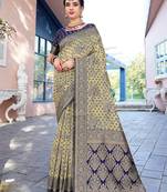 cream & blue ethnic motifs woven design zari organza saree