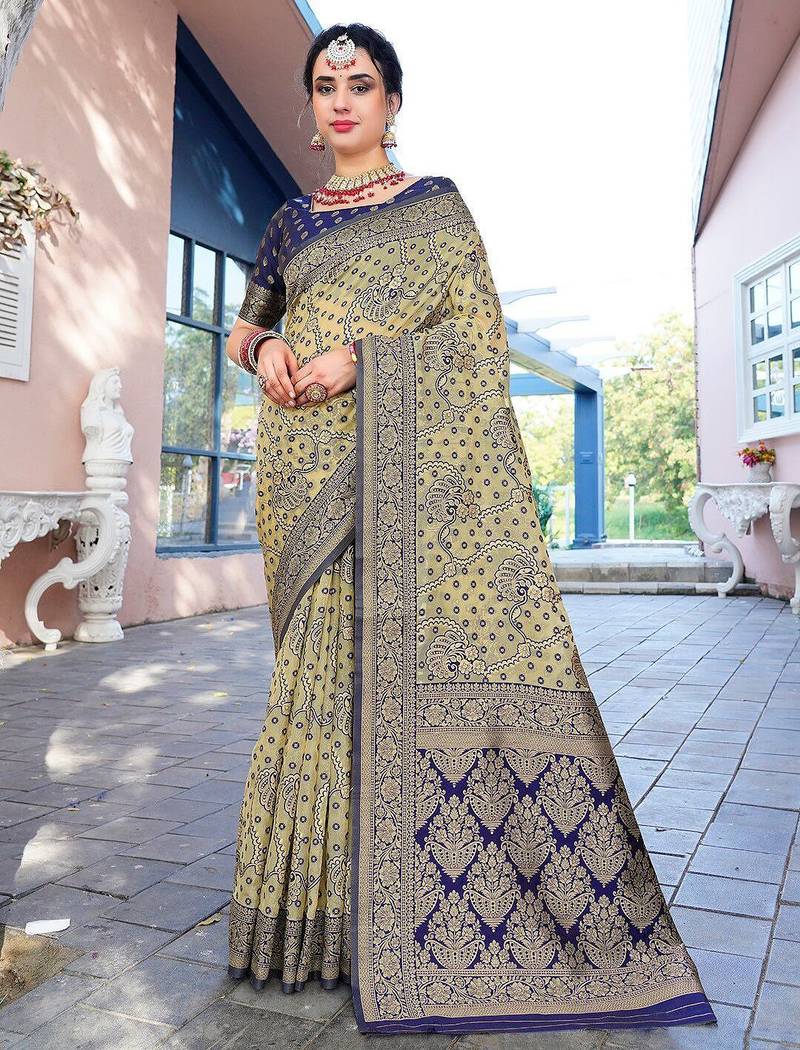 cream & blue ethnic motifs woven design zari organza saree