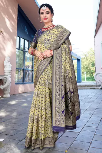 cream & blue ethnic motifs woven design zari organza saree