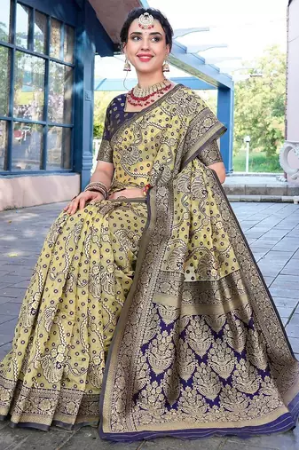 cream & blue ethnic motifs woven design zari organza saree