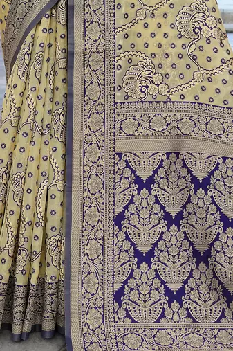 cream & blue ethnic motifs woven design zari organza saree
