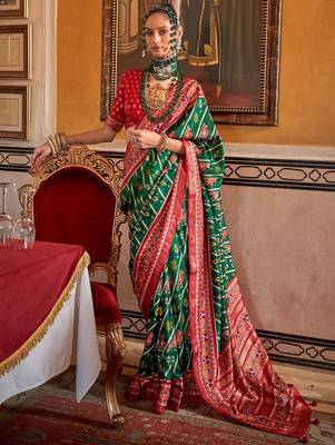 Green ethnic motifs zari patola saree 1