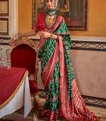 Green ethnic motifs zari patola saree