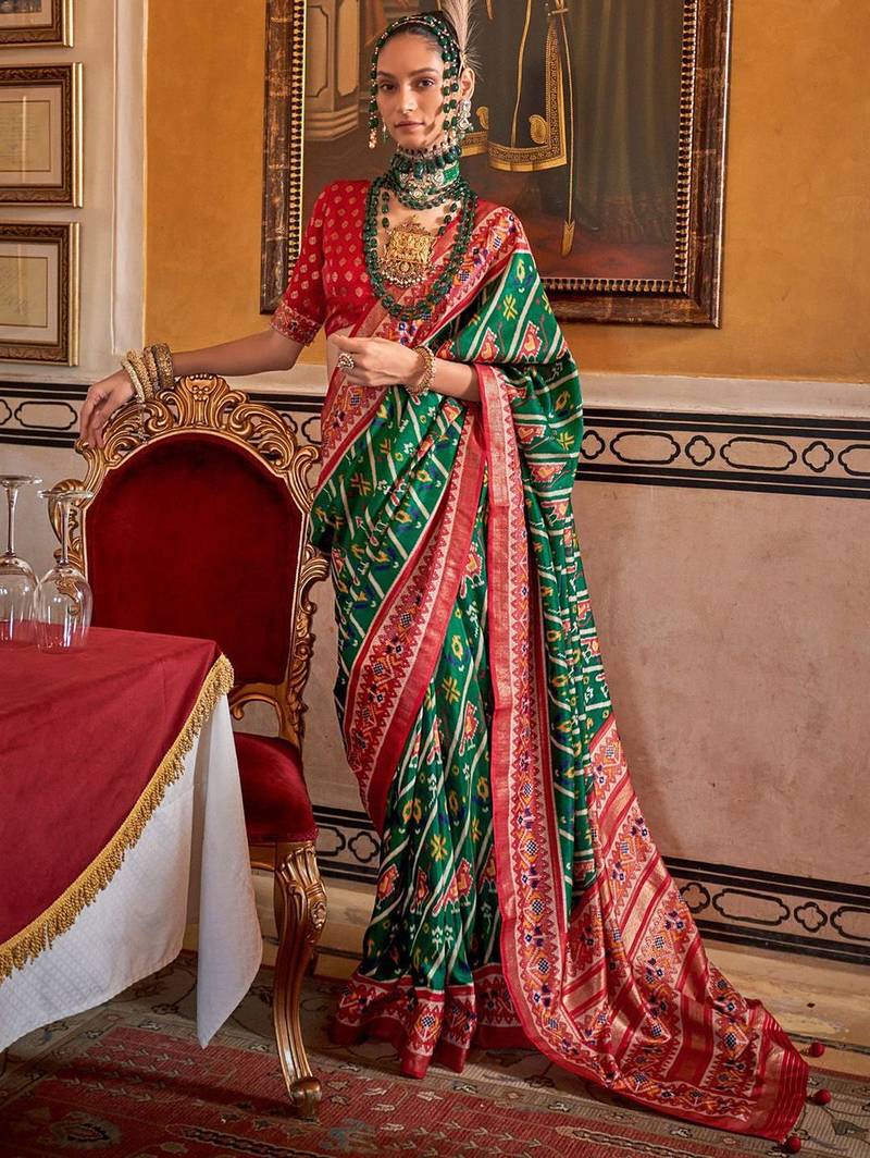 Green ethnic motifs zari patola saree