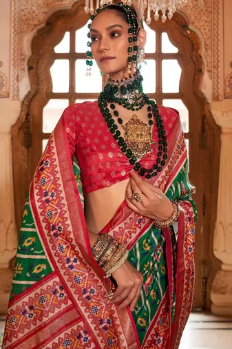 Green ethnic motifs zari patola saree