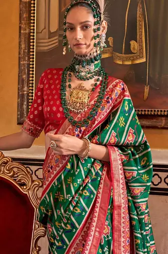 Green ethnic motifs zari patola saree
