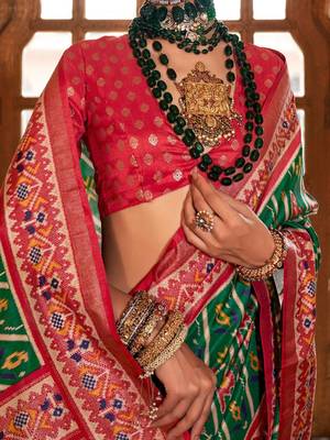 Green ethnic motifs zari patola saree 4