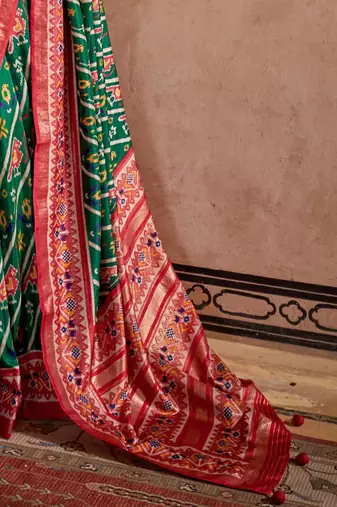 Green ethnic motifs zari patola saree