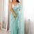 turquoise floral sequinned poly georgette designer saree