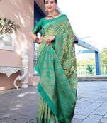 turquoise blue & cream-coloured ethnic motifs woven design saree