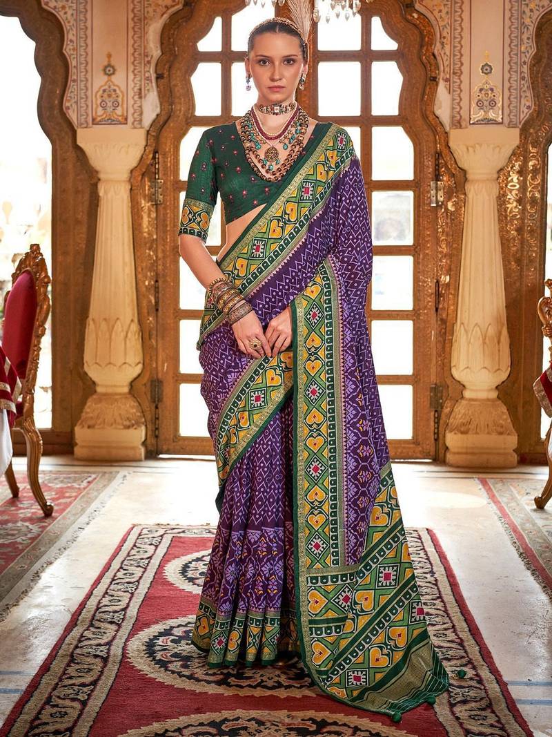 Purple ethnic motifs zari patola saree