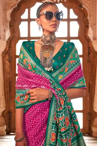Pink ethnic motifs zari patola saree