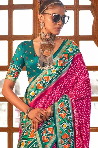 Pink ethnic motifs zari patola saree