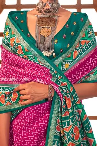 Pink ethnic motifs zari patola saree